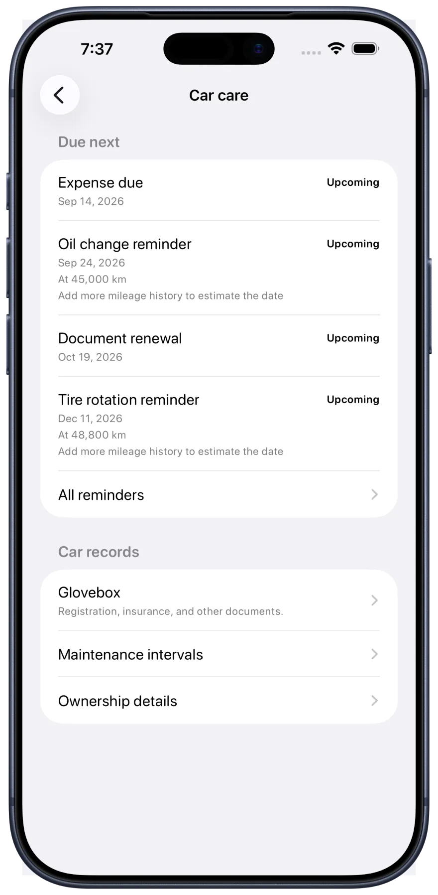Fillo reminders screen in an Apple iPhone frame, showing date-based and odometer-based service reminders.
